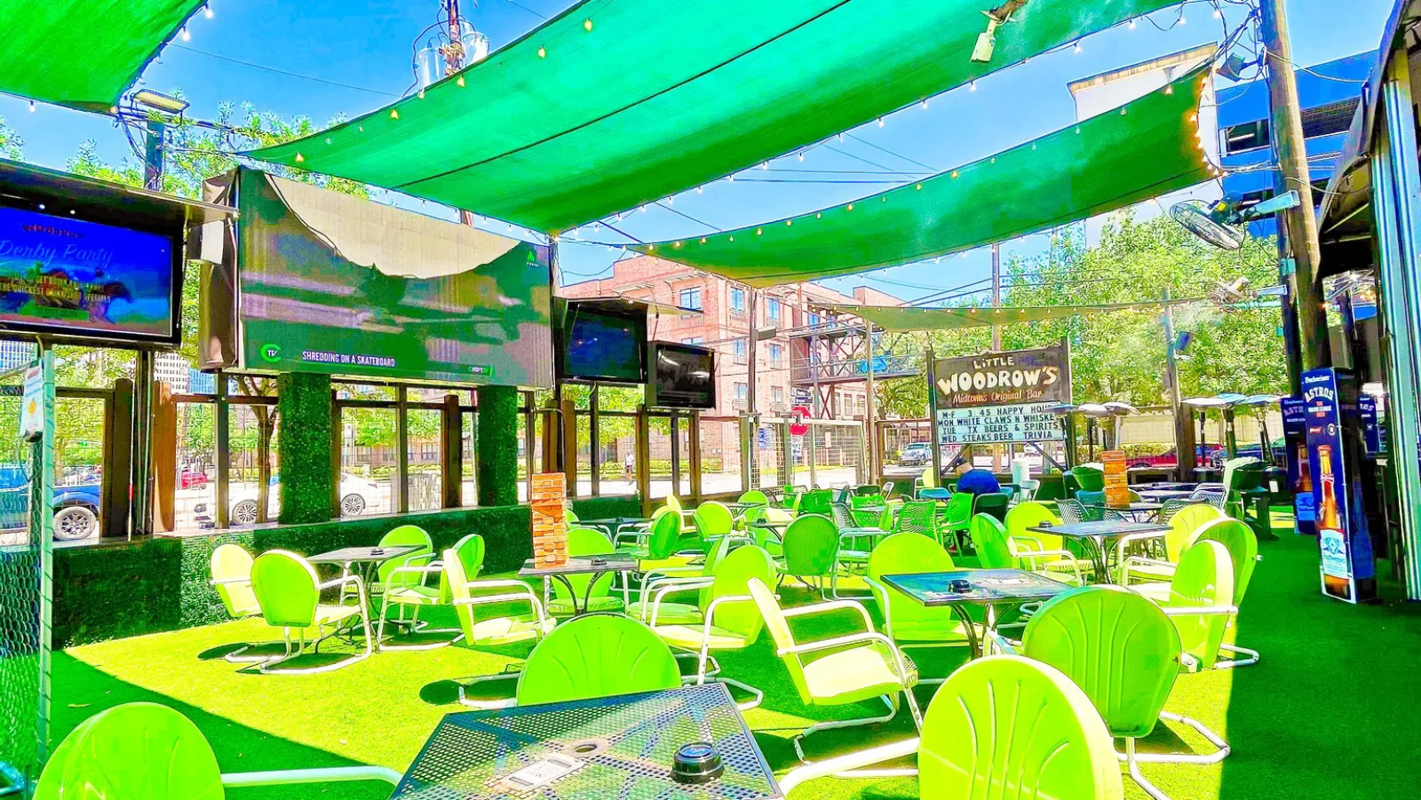 A large outdoor patio with string lights at Little Woodrow's Midtown